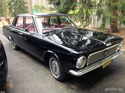 PICTURE CAR SERVICES LTD | Plymouth Valiant Black 1964