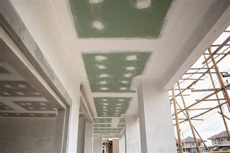 Ceiling Gypsum Board Installation at Construction Site Stock Photo ...