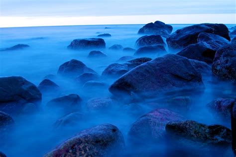 Time-lapse photography of fog on large rocks HD wallpaper | Wallpaper Flare