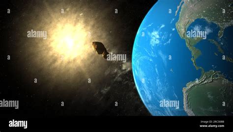 Toutatis asteroid very near of earth planet with the sun Stock Photo ...