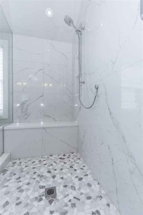 Classic marble look shower with the Mayfair Statuario Venato 24x24 ...