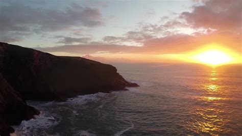 Aerial View Following A Cliff Edge At Sunset (Cornwall, UK) [50% Speed ...