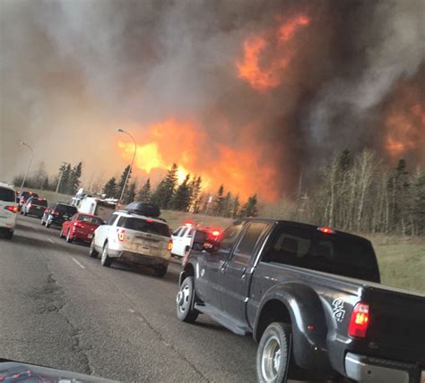 Oilsands firms halt production, take in evacuees as wildfires rage in ...