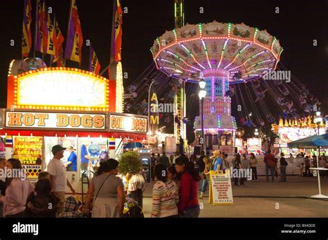 People enjoying rides at the North Carolina State Fair Stock Photo - Alamy