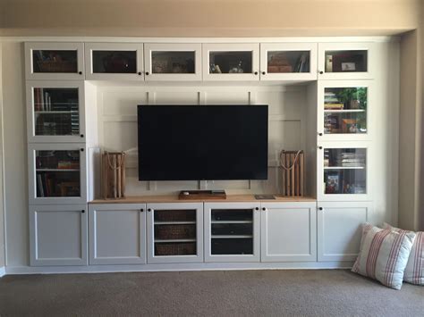 Built in media using IKEA cabinets and lumber. # ...