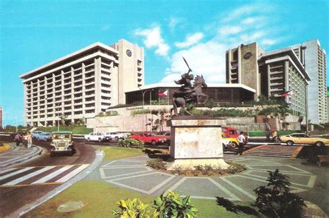 The Monument of Gabriela Silang and The Manila Peninsula Hotel in the ...