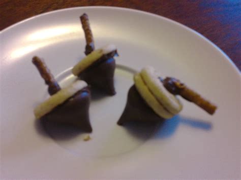 edible acorns hersey kiss, mini cookie, pretzel and glue with nut ...