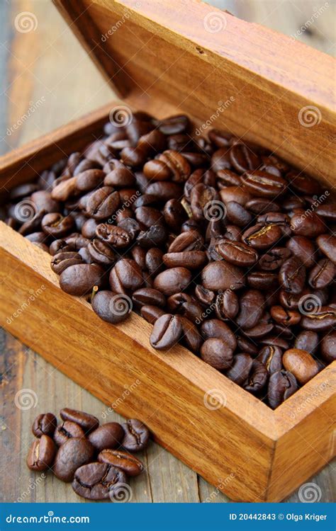 Flavored Coffee Beans In A Wooden Box Stock Photos - Image: 20442843