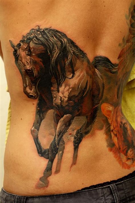 Great watercolor horse tattoo on back - Tattooimages.biz