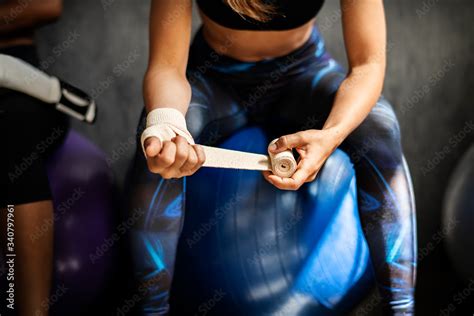 Wrapping a hand bandage Stock Photo | Adobe Stock