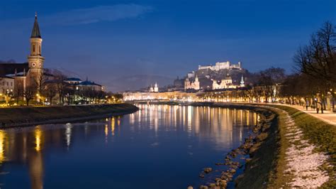 The fortress, Cathedral, and river at night in Salzburg, Austria image ...