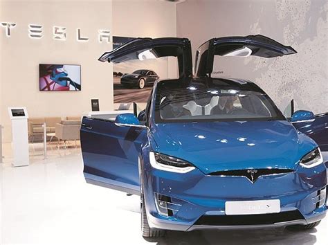 Tesla surges past $100 billion market value, eclipsing Volkswagen ...