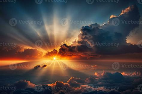 Sunrise dramatic blue sky with orange sun rays breaking through the ...