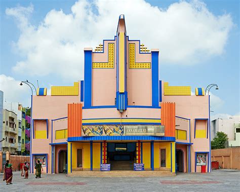 vibrant façades animate movie theater architecture in south india