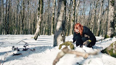 Young woman in the mountain playing with snow 37765053 Stock Video at ...