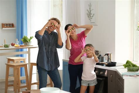 Happy Family Having Fun while Cooking in Kitchen Stock Photo - Image of ...