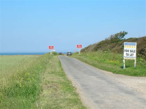 Seaside Road towards the cliffs,... © JThomas cc-by-sa/2.0 :: Geograph ...