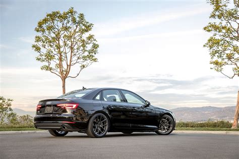 Vorsteiner Redesigns Elegant Black Audi A4 — CARiD.com Gallery