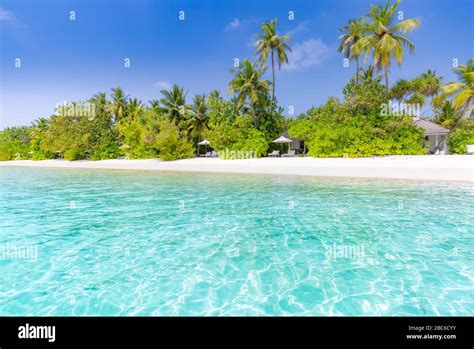 Luxury vacation, summer vibes. Tranquil beach scene. Exotic tropical ...