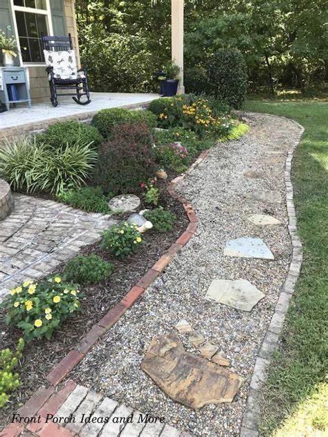 a stone path in front of a house