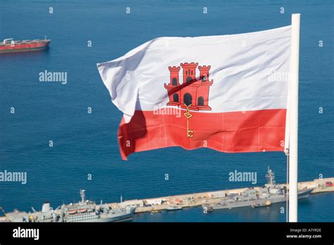 Gibraltar Gibraltarian flag showing castle and key Stock Photo - Alamy