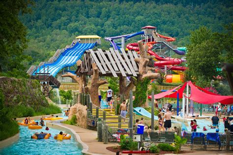 the water park is full of people and slides