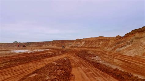 Mining industry. Aerial view of road to industrial territory sand mine ...