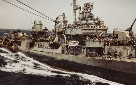 Fletcher-class destroyer engages in transfer at sea operations with USS ...