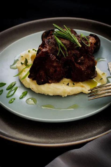 Oxtail Braised in Red Wine and Fresh Herbs - Hunger for Spice | Oxtail ...