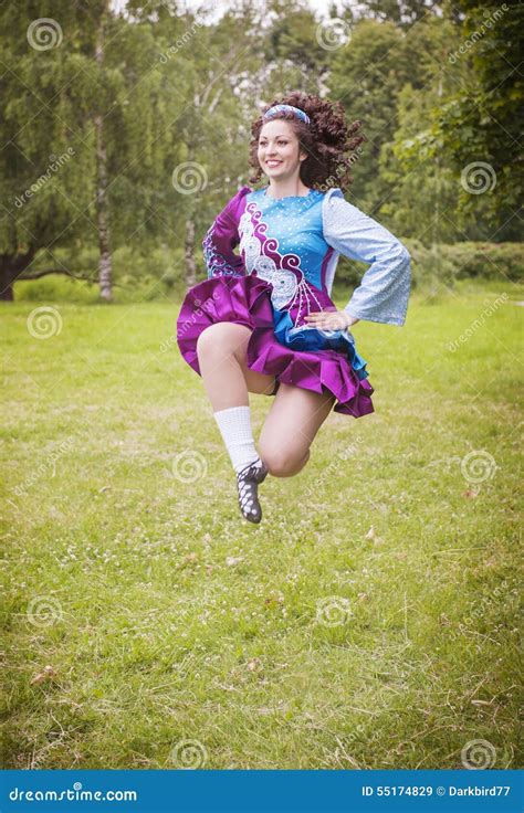 Young Beautiful Girl in Irish Dance Dress Jumping Outdoor Stock Image ...