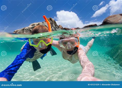 Family Snorkeling in Tropical Water Stock Image - Image of ocean, child ...