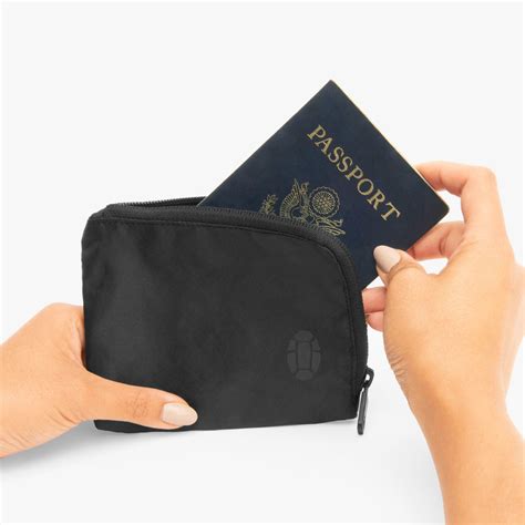 Passport Holder For Women & Men Travelers by Tortuga