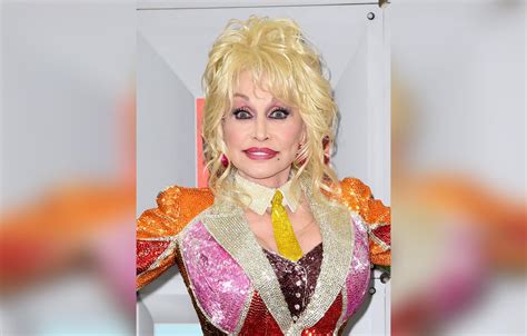 Dolly Parton's Plastic Face Fiasco Revealed In Shocking New Photos