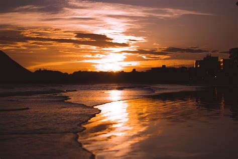 Silhouette photo of Beach during Sunset · Free Stock Photo