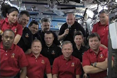 Shuttle Discovery's crew: a moment to reflect amid rush to complete ...