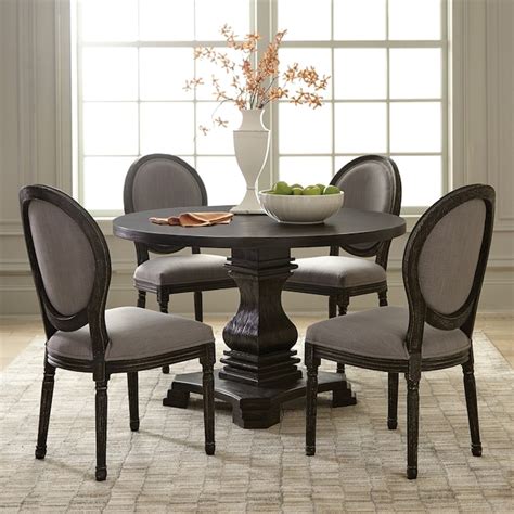 Scott Living Antique Black Round Dining Table in the Dining Tables ...