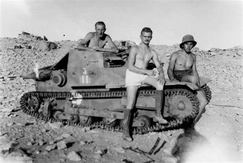 Italian soldiers with an L3/33 tankette in North Africa. Pin by Paolo ...