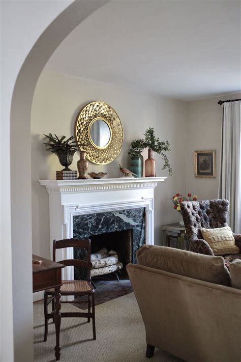 Round Mirror Above Fireplace - Councilnet