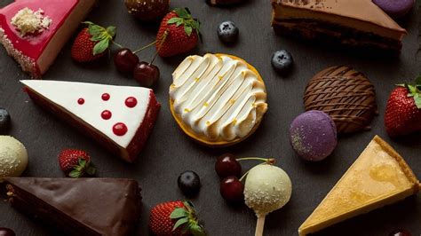 Download Assorted Cakes And Cookies Dessert Wallpaper | Wallpapers.com