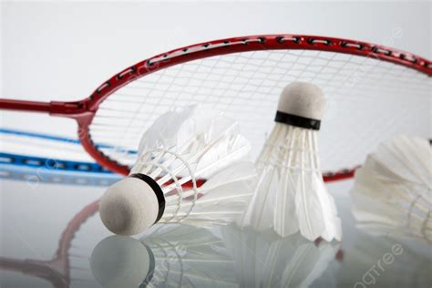 A Set Of Badminton Paddle And The Shuttlecock A Set Of Badminton Paddle ...