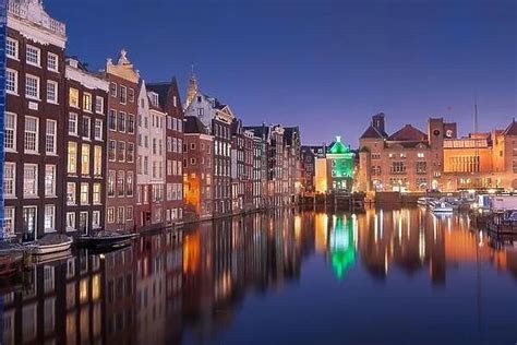 Amsterdam, Netherlands in the Damrak at night Our beautiful Wall Art ...