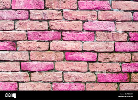 Pink brick background hi-res stock photography and images - Alamy