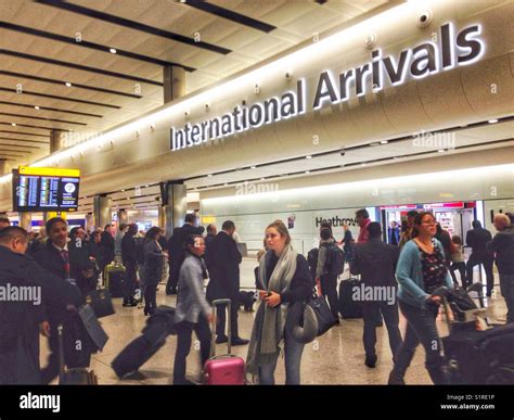 International Arrivals at Heathrow Airport, terminal 2 Stock Photo - Alamy