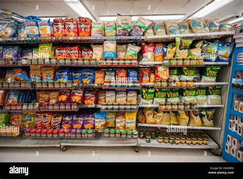 A display of tasty snacks are seen in a supermarket in New York on ...