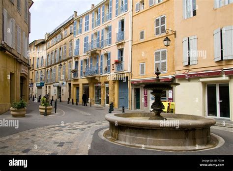 Traditional architecture in a street in Aix en Provence, France with a ...