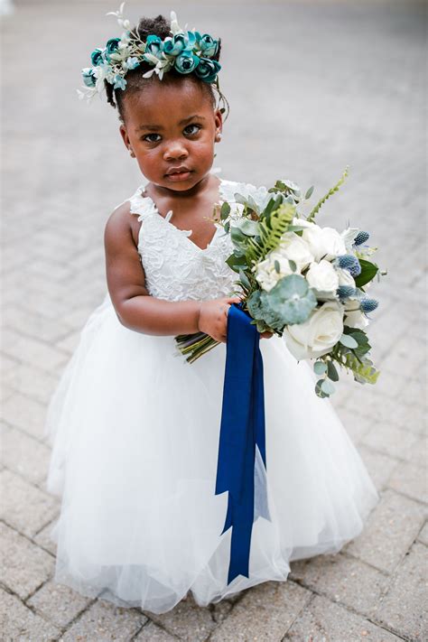 Flower Girl Holding Bouquet During Wedding at The Estate at Cherokee ...