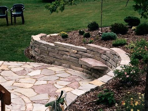 Large Stone Retaining Wall with Patio and Sitting Stones | Oasis ...