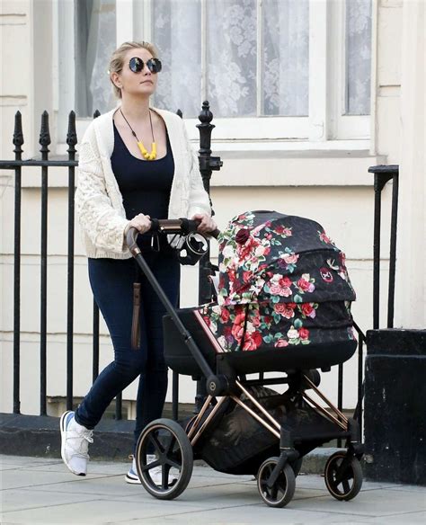 Rachel Riley - Seen with baby daughter Maven Aria in Central London-01 ...