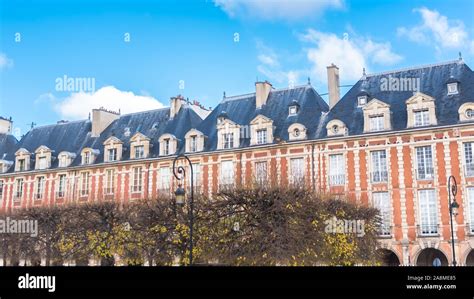 Paris, place des Vosges, beautiful buildings and public garden ...