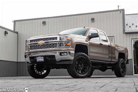 Lifted 2014 Chevy Silverado 1500 with 7 Inch Rough Country Suspension ...